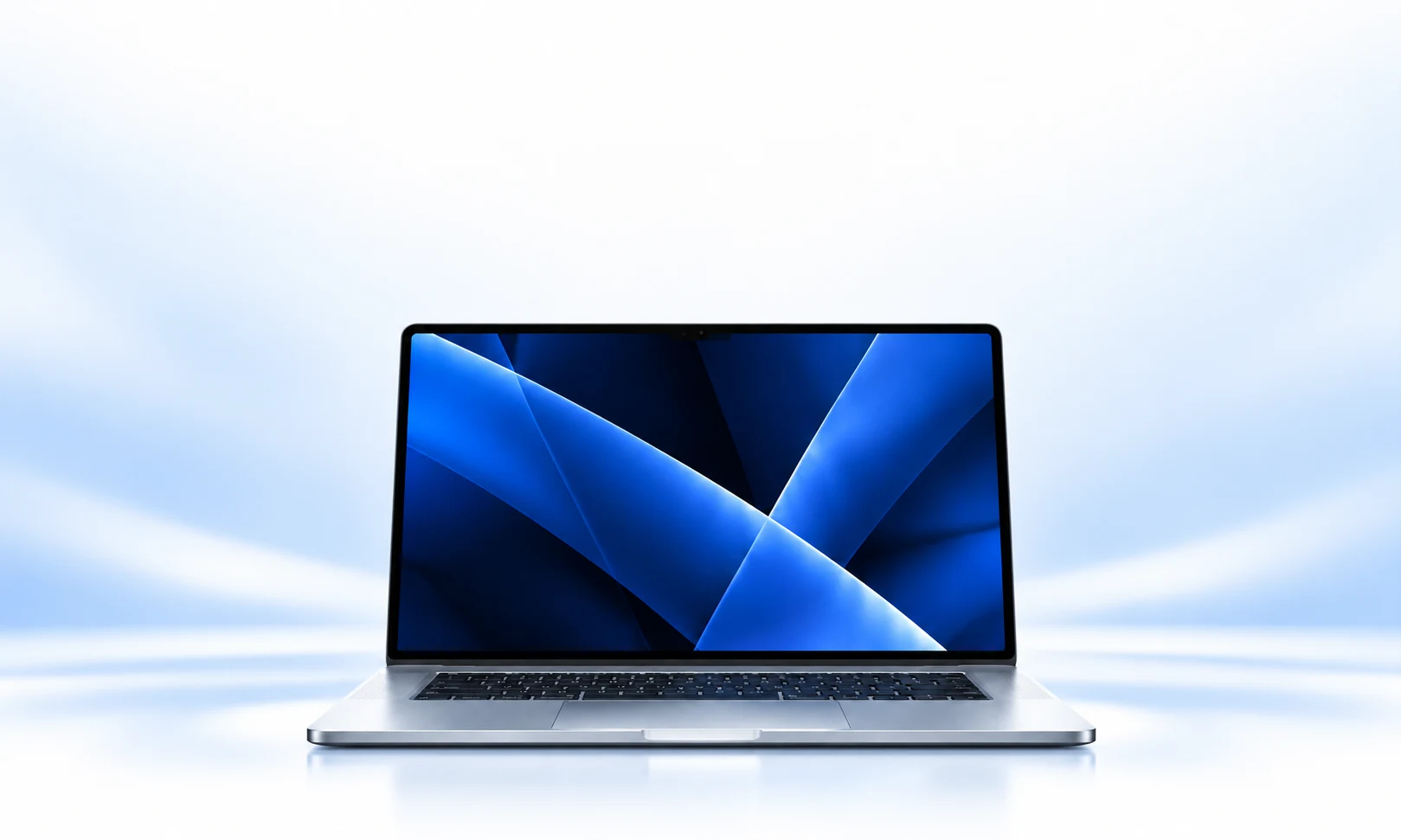 Крупный MacBook с синим экраном на светлом фоне